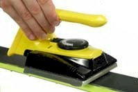Melt ski wax with a waxing iron for best results.